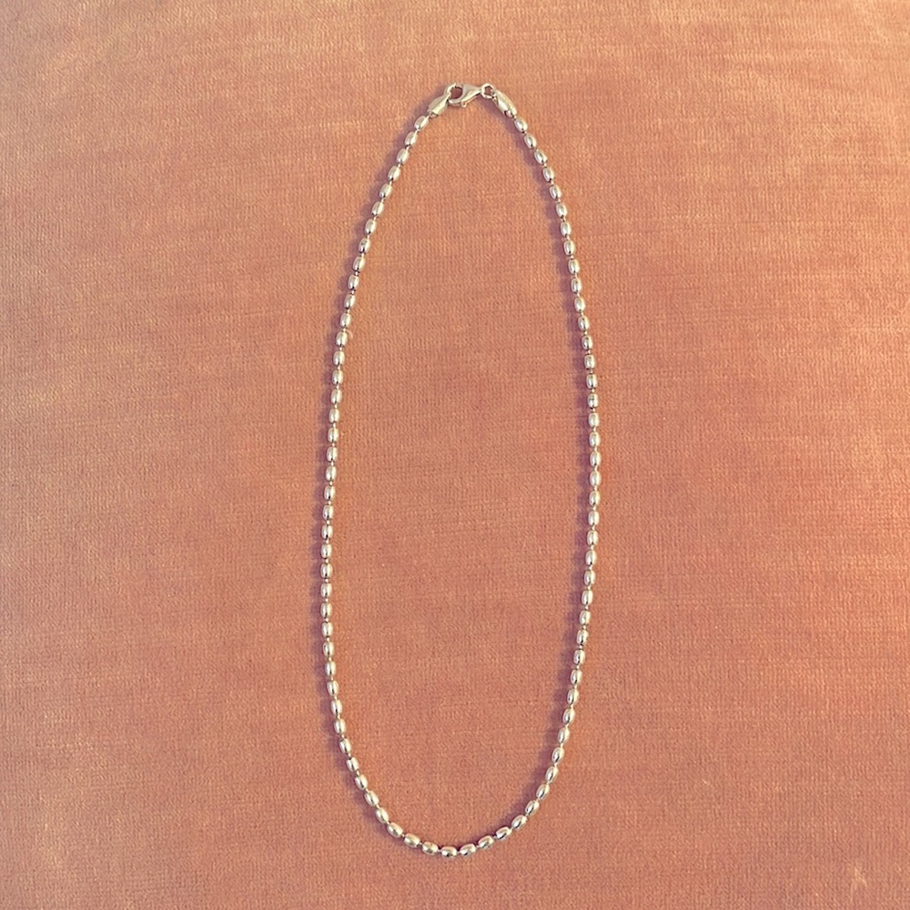 18” necklace with small oval shaped sterling beads